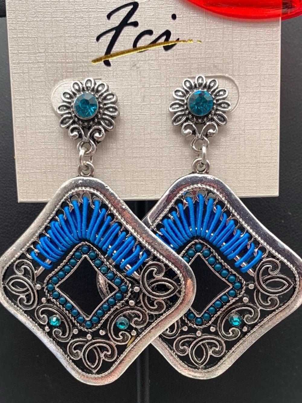 Silver tone Filigree Drop Earrings with blue rhinestones and Accents